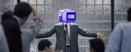 a man in a suit stands in front of a microphone with a purple box on his head ..