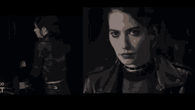a woman in a black leather jacket and choker
