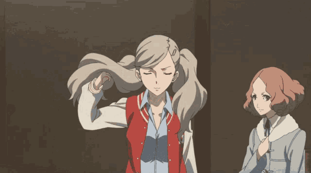 a girl in a varsity jacket is pointing