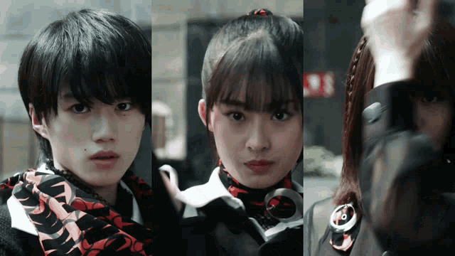a boy and two girls are standing next to each other in front of a fire exit