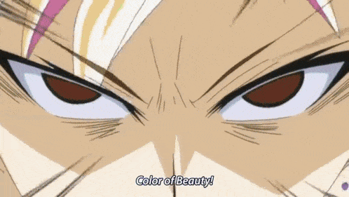a close up of a cartoon character 's eyes with the words color of beauty written on the bottom .