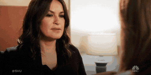 a woman talking to another woman with the hashtag #svu on the bottom
