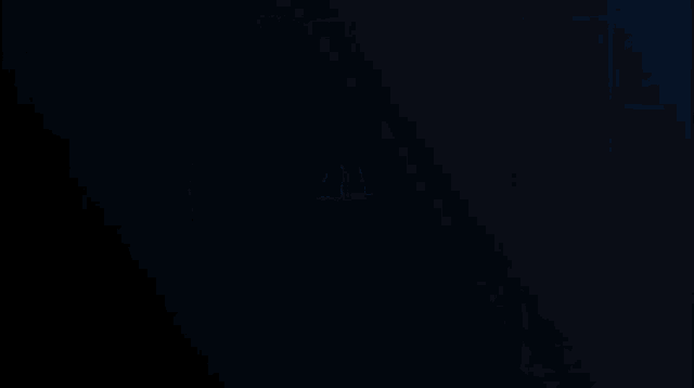 blue and white circles on a black background with a glowing center