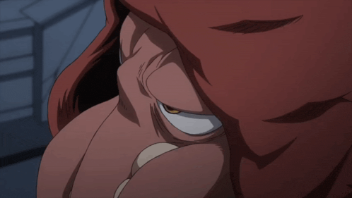 a close up of a person 's face with a large yellow eye