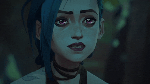 a close up of a woman 's face with blue hair