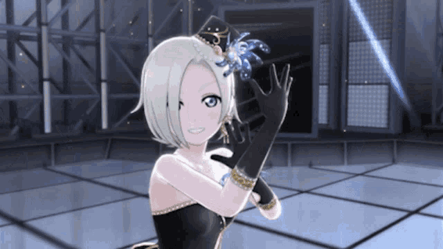 a girl in a black dress and black gloves stands in a dark room