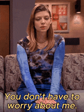 a woman sitting on a couch with the words " you don t have to worry about me "
