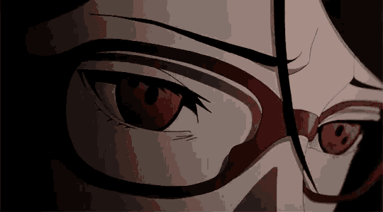 a close up of a person 's eyes with glasses on .