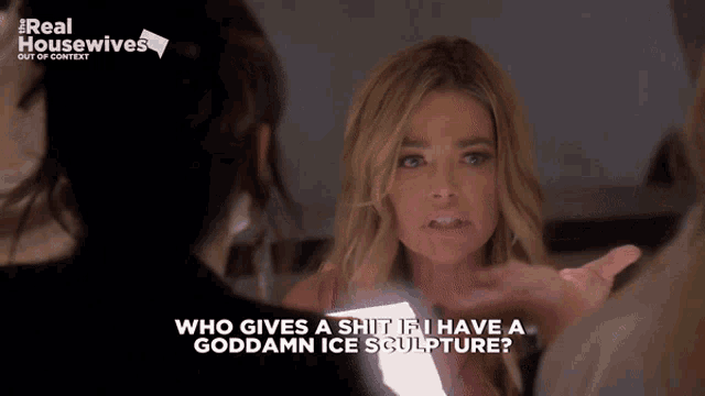 a woman talking to another woman with the words who gives a shit if i have a goddamn ice sculpture on the bottom
