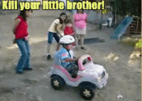a little boy is driving a toy car with the words kill your little brother written above him