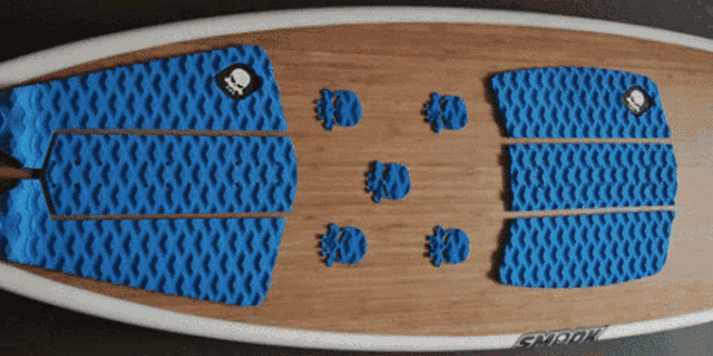 a surfboard that says smook on the side