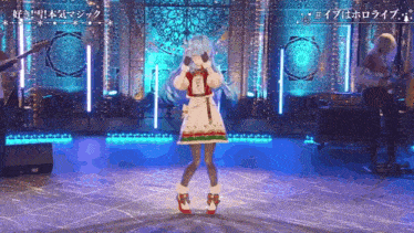 a girl with blue hair is dancing on a stage while a band plays behind her