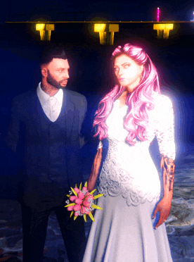 a man in a suit and a woman in a wedding dress holding a bouquet of flowers