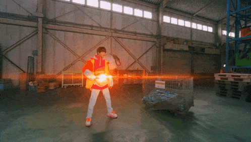 a person standing in a warehouse with a light coming out of their chest