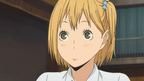 a girl with a star in her hair looks surprised
