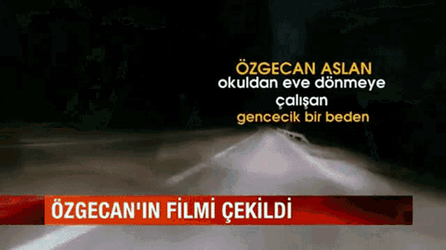 a screen shows a car driving down a road at night with the words özgecan aslan okuldan eve dönmeye