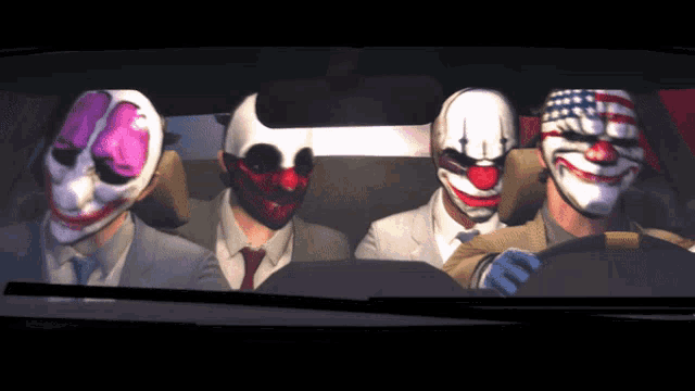 a group of men wearing masks in a car