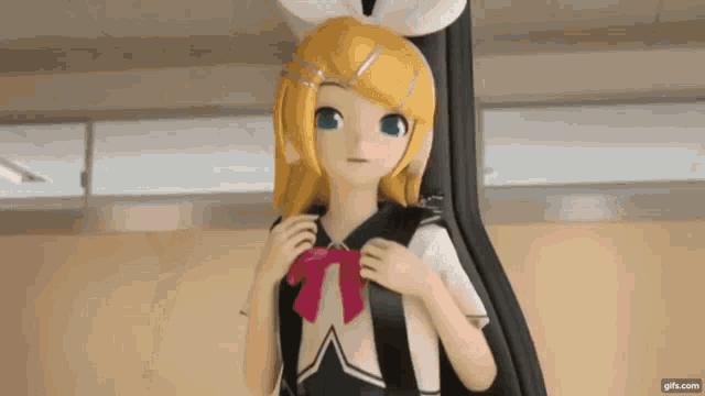 a girl in a school uniform is standing next to a guitar case in a room .