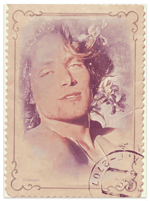 a postage stamp with a picture of a man with a flower in his hair