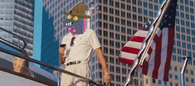 a man with a cartoon face on his face is standing on a staircase next to an american flag