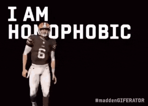 a football player wearing a brown jersey with the number 6 on it is raising his hands in the air .