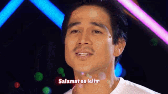 a man singing a song with the words salamat sa lalim