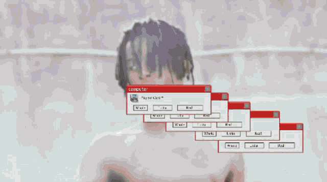 a computer screen shows a man with purple hair and a message that says " computer "