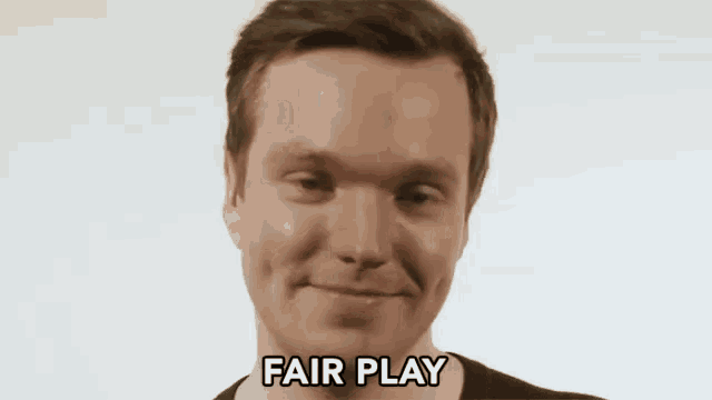 a man with his eyes closed and the words fair play above his head