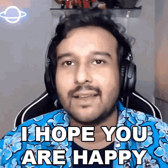 a man wearing headphones says i hope you are happy