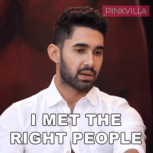 a man with a beard and a white shirt says i met the right people