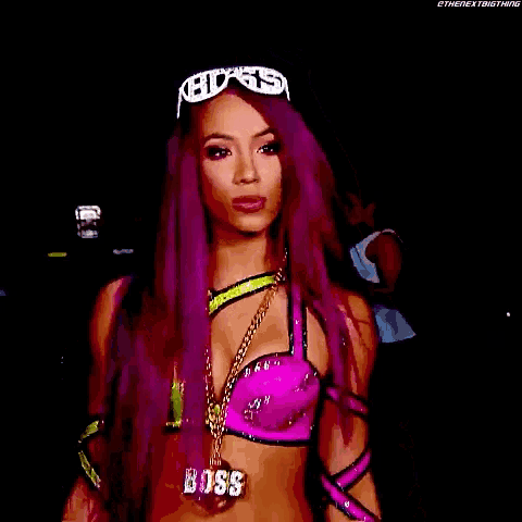 a woman with purple hair is wearing sunglasses that say boss on them