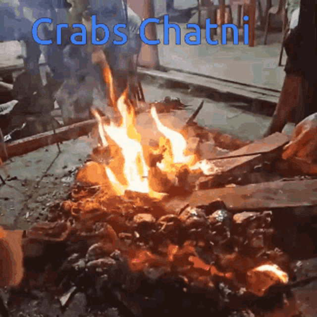 crabs chatni is written above a fire with crabs on it