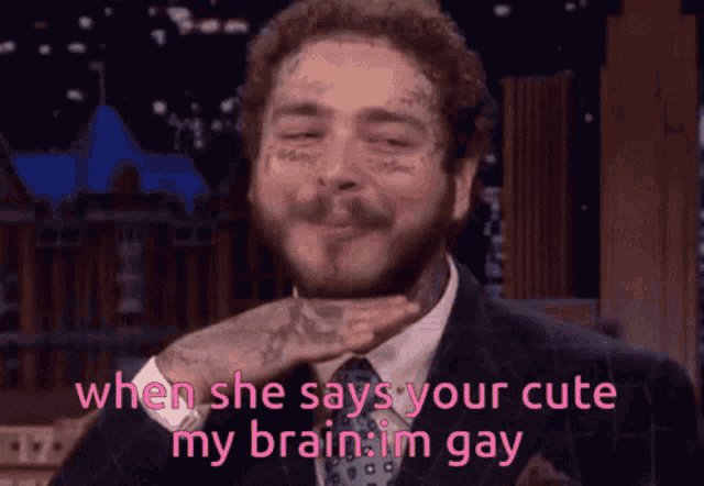 a man in a suit and tie says when she says your cute my brain i m gay