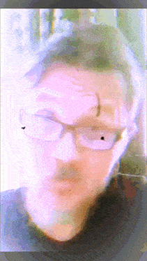 a close up of a man wearing glasses with a purple background