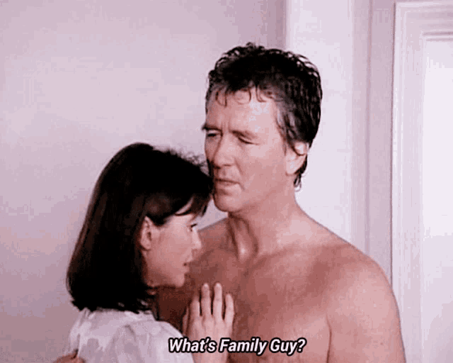 a shirtless man is being kissed by a woman who is asking him what 's family guy