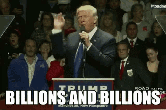 a man stands at a podium with the words " billions and billions " on it