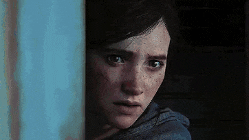 a close up of a woman 's face peeking out from behind a door .