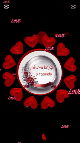 a circle with red hearts around it and the words love on it