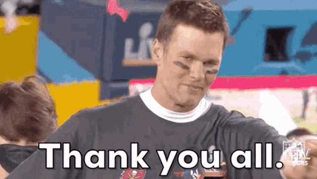 a man is wearing a t-shirt that says thank you all