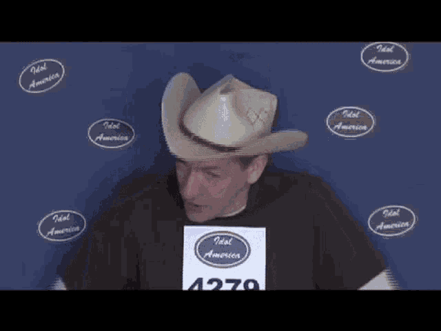 Gary Wendall Remove Hat GIF - Gary Wendall Remove Hat Audition GIFs