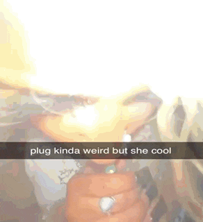 a picture of a woman smoking a cigarette with a caption that says plug kinda weird but she cool