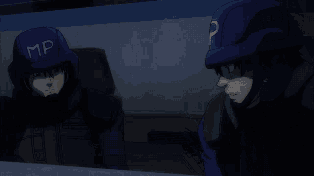 two men wearing blue hats with mp on them