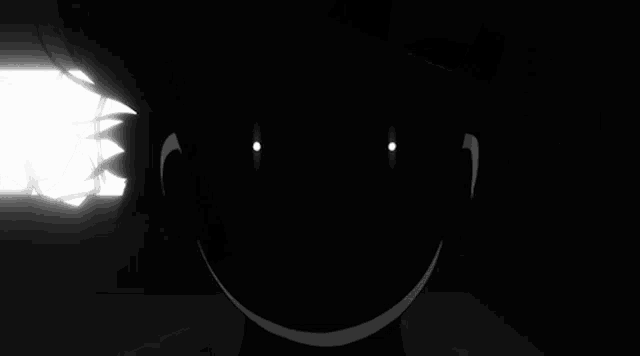 a silhouette of a person with glowing eyes against a white background