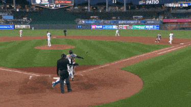 a baseball game is being played in a stadium sponsored by state farm and pepsi