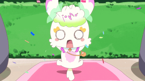 a cartoon character with a crown on his head is standing on a pink mat