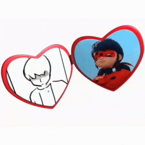 a heart shaped mirror with ladybug on it