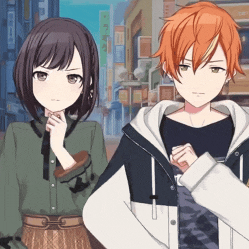 a boy and a girl are standing next to each other in front of a sign that says ' cafe ' on it