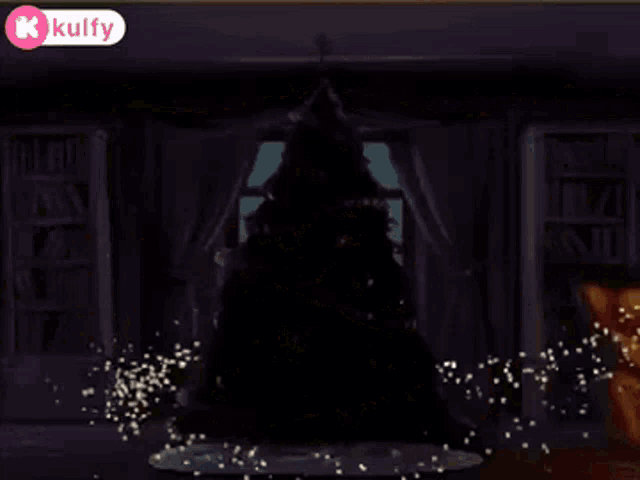 a christmas tree in a room with a kolfy logo