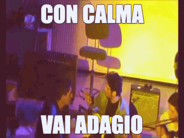 a man playing a guitar with the words " con calma vai adagio " on the bottom