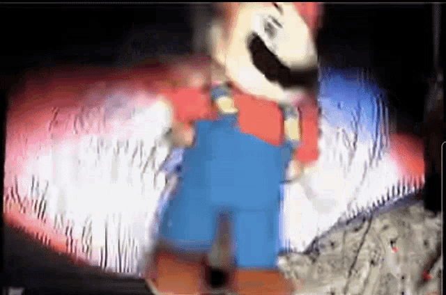 a close up of a mario video game character on a screen